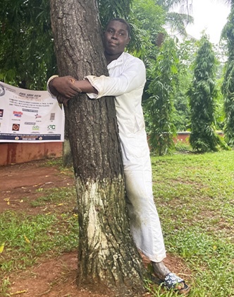 abdul-hugging-a-tree-1