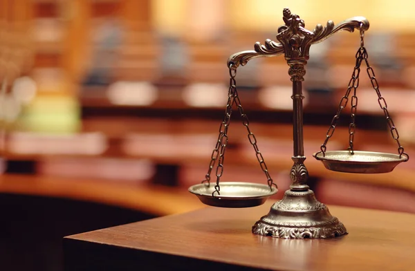 depositphotos_26276163-stock-photo-decorative-scales-of-justice-in