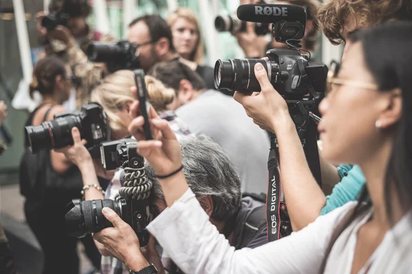 depositphotos_53745909-stock-photo-professional-photographers-during-milan-fashion